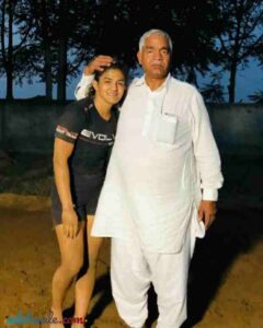 Ritu Phogat with her father Mahavir Phogat