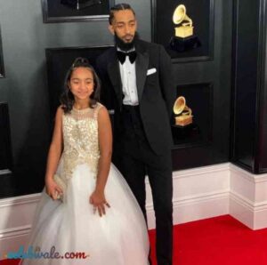 Nipsey Hussle with her daughter